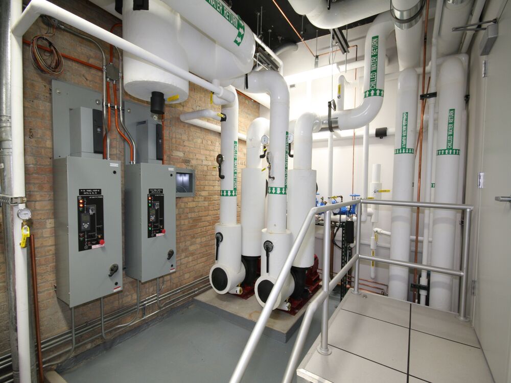 Mechanical plant room inside a historic brick building